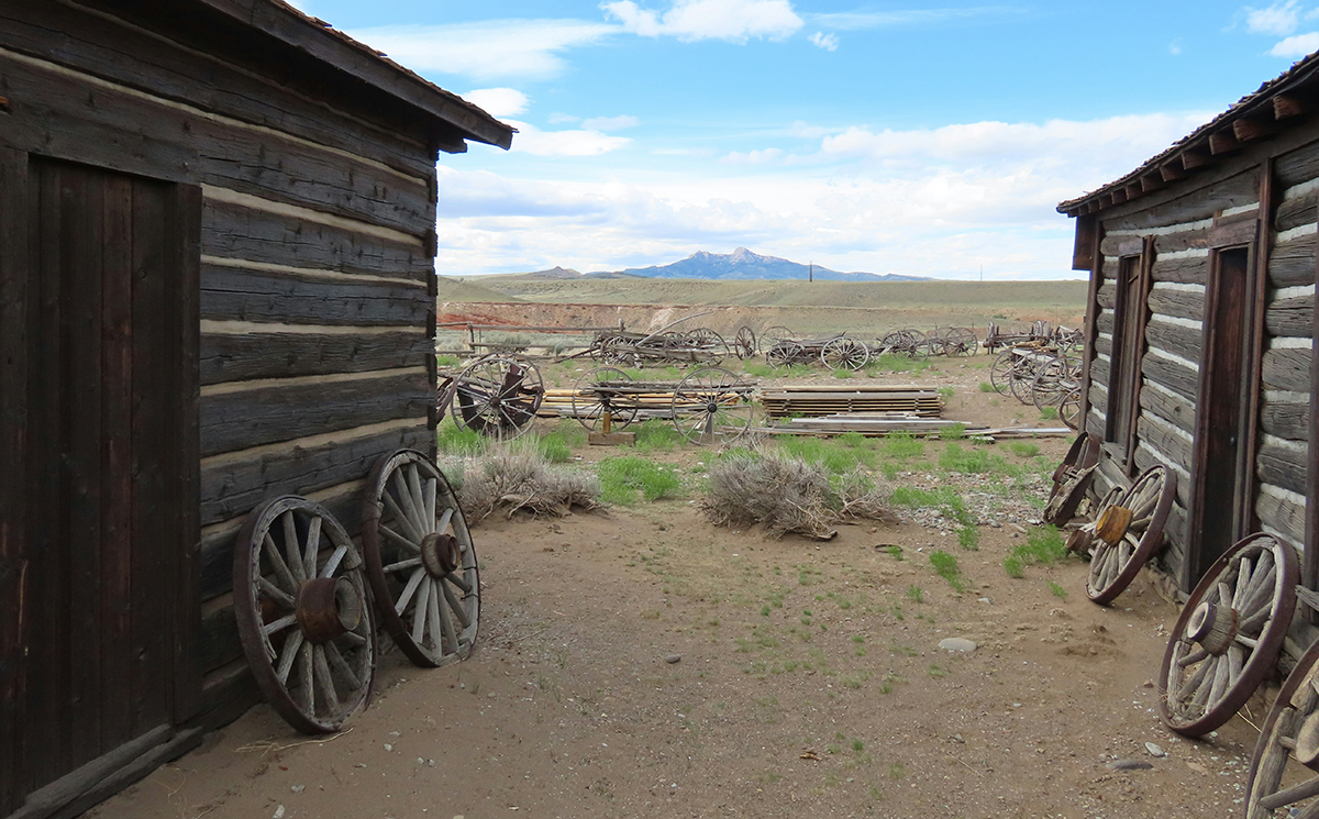 Things to Do in Cody Wyoming: Top 10 Guide to the Rodeo Capital of the World 5 Historic log cabins and antique wagon wheels at Old Trail Town in Cody Wyoming