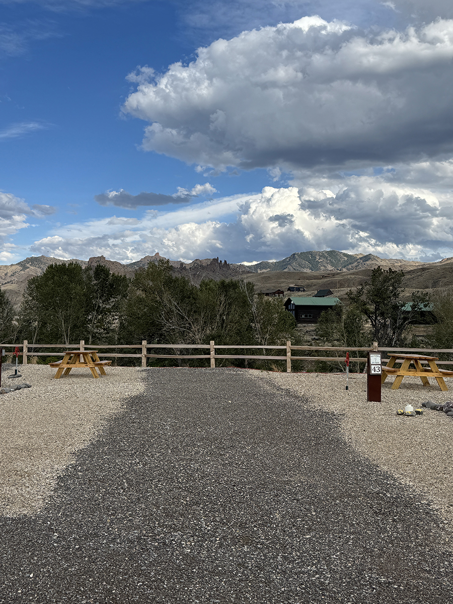 Empty RV site with picnic tables and mountain views near Yellowstone