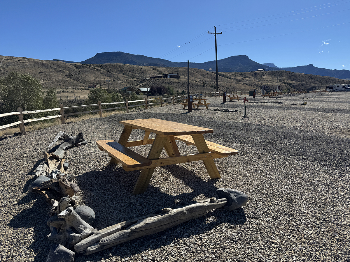 Thank You for an Amazing 2026 Season at Old Faithful RV Park 4 New wooden picnic table at an RV site with mountain views at Old Faithful RV Park